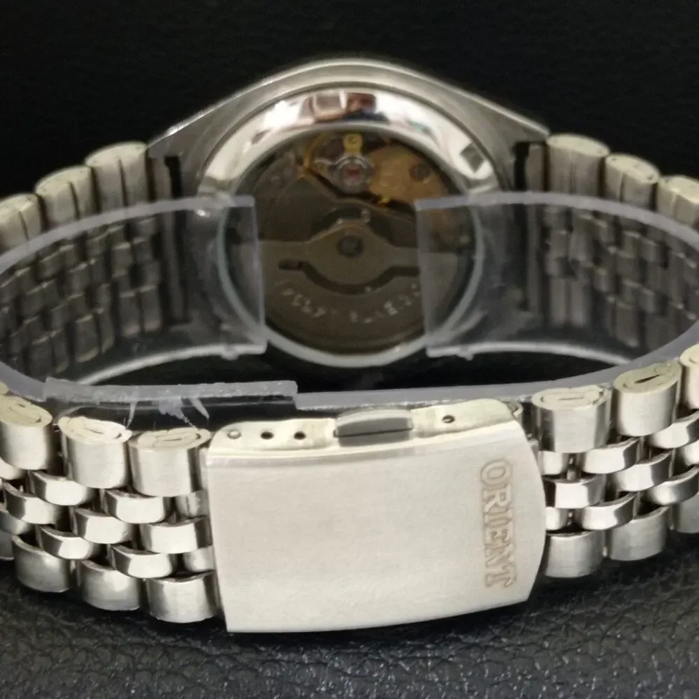 Vintage 1982 Orient Automatic Mens Silver Watch W/daydate & Blue accents